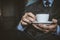 Close up image senior businessman with a cup of coffee. Focus on