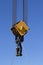 Close up image of a steel cable pulley on a crane