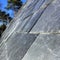 Close up image of a steep slate roof