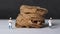 Close-up images of whole wheat pasta and two miniature chefs. The