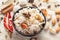 Close-up of Indian Basmati Rice or Kasmiri pulao pulav or Dry Fruits Pulao garnished with dry fruits and spices in a black bowl