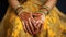 Close-up of indian bridal hands with henna tattoo