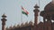 close up of the indian flag flying above red fort in old delhi- 4K 60p
