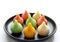 Close up of Indian sweet food Modak also Know as Laddu served in a plate.