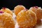 Close up of Indian sweet Motichoor Laddoo or Bundi Laddu. Coconut sweet Laddoo or Nariyal Ladduis on black background.