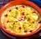 Close up of Indian Sweet - rasmalai in an earthen bowl