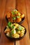 Close-up of Indian vegetarian classic combination of dishes  Jeera Aloo Potatoes in cumin Flavored  and spicy Potato and Tomato