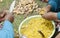 Close Up Of Indigenous Women Hands Cutting Potatoes