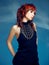 Close-up indoor portrait of lovely girl with colorful hair. Studio shot of graceful young woman with short haircut