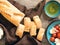 Close up ingredients for making bruschetta on wooden table