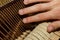 A close-up of the internal parts of a piano or grand piano. Selective focus. Details of the musical instrument from the