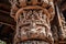 close-up of intricate carving on the columns of a pagoda