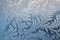 close-up of intricate frost patterns on a window