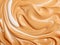 Close-Up: The Intricate Texture of Smooth Peanut Butter - A Unique View