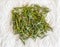 Close up of isolated Aromatic Fresh rosemary drying on a paper towel