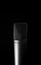 Close Up Isolated microphone over black background