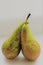 A close-up on an isolated pair of pears with white background