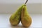 A close-up on isolated two pears on white background