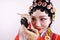 Close-up isolated white background Beijing opera Chinese female actress woman makeup traditional headwear costume drama portrait