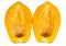 Close-up isolates of large, seedless yellow ripe papaya, halved