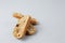 Close up Italian biscotti cookies on baking paper. Fresh baked cookies with nuts and dried cranberries with selective focus