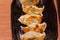 Close up japaneese gyoza dumplings with meat and mushrooms thai street food market