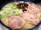 Close up of Japanese barbecued char siu pork ramen noodles