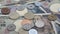 Close up of Japanese coin yen falling on banknotes 1000 and 10000 yen background