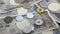 Close up of Japanese coin yen falling on banknotes 1000 and 10000 yen background. Super slow motion 120 fsp