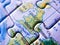 Close up of a jigsaw puzzle map depicting London and United Kingdom