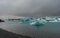 Close Up of Jokulsarlon Glacier Lagoon in Iceland. Cloudy Sky, Floe and Icebergs