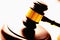 Close up judges wooden gavel as symbol of justice, court decisions and crime