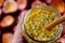 Close up juice jar from passion fruit or passiflora edulis on hard rind background