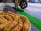 A close up of Kaasstengels, Kastengel or Cheesecake.  pastries that are usually served during Eid in Indonesia