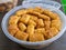 A close up of Kaasstengels, Kastengel or Cheesecake.  pastries that are usually served during Eid in Indonesia