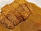 Close up of Katsu Curry Don, Japanese katsu curry served with chicken katsu or tonkatsu over rice