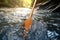 close-up of kayak paddle through rushing water