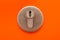 Close up of keyhole on orange door
