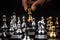 Close up king chess challenge or battle fighting with falling chess on chess board