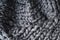 Close-up of knitted grey blanket