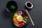 Close-up of Korean dish, with variety of appetizers with vegetables and eggs. Diet. bibimbap. Top view. Round plate