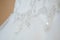 Close up of a lace on a wedding dress. High quality photo.