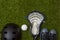 Close-Up Of Lacrosse Equipment On Green Grass Background. Team sport concept