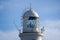 Close up of the lamp house at the top of Portland Bill lighthouse in Portland, Dorset, UK