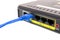 Close up LAN UTP RJ45 Cat5e In front of ADSL Router