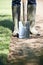 Close Up Of Landscape Gardener Laying Turf For New Lawn