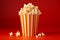 Close-up of large cinema popcorn cup filled to the brim for movie theater snacking experience