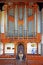 A close up of a large grand church organ pipes