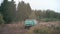 Close-up of large green suvs participating in a off-road racing. Clip. Russian roads