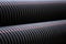 Close-up of large plastic corrugated pipes for water supply systems